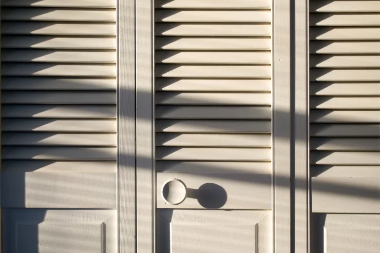A closet covered without doors