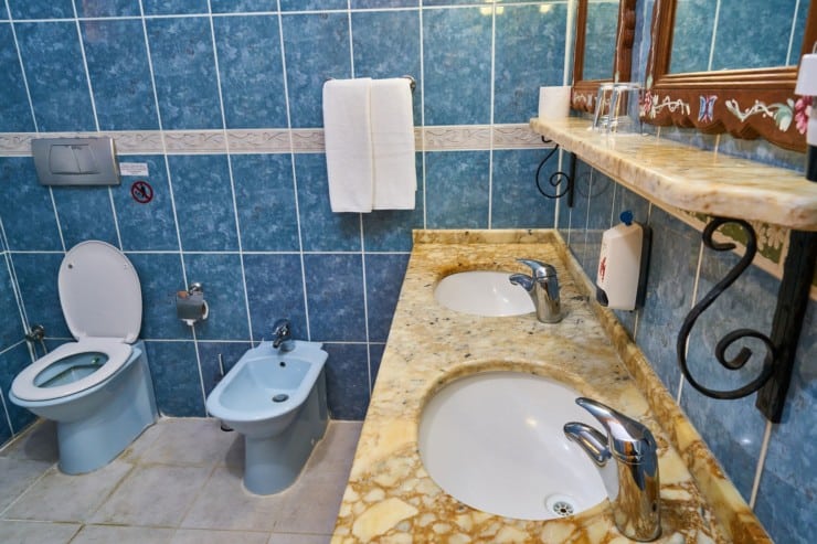 How high should you tile a bathroom wall?