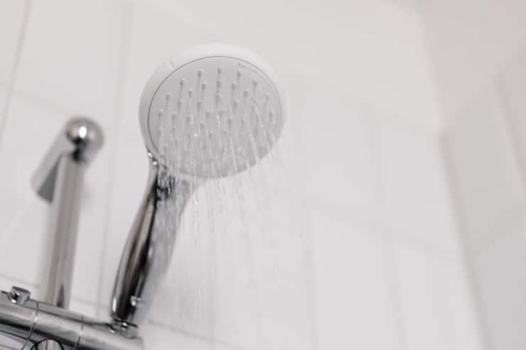 How do you remove a shower head from an apartment?