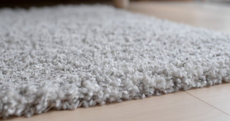 How do you get the weird smell out of new carpet?